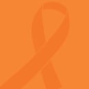An orange card with a cancer memorial ribbon on it