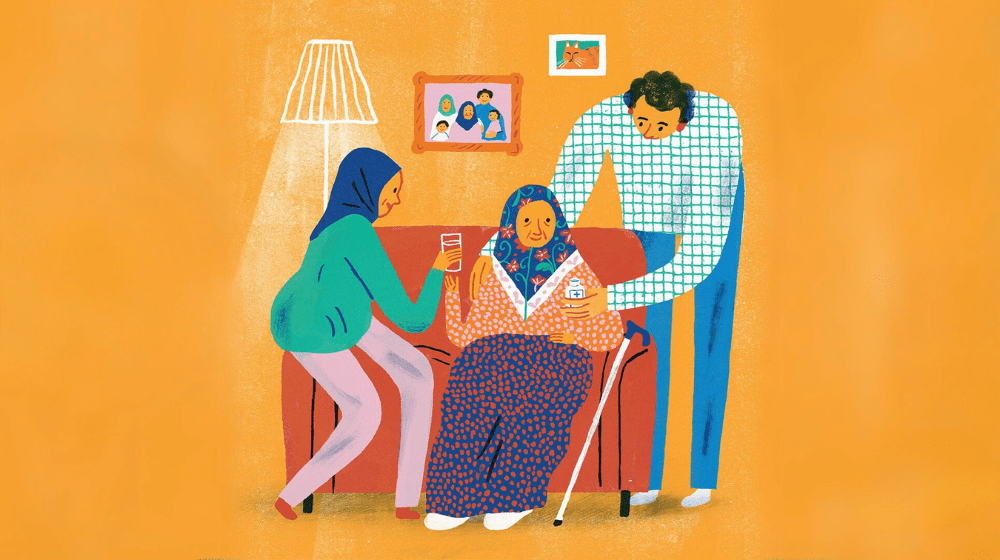 Illustration on a bright orange background showing an older woman in floral headscarf and polkadot patterned outfit sitting on an red sofa with a cane resting next to her. On either side of her, a man and a woman in a headscarf tend to her, handing her a glass of water and her medication. Setting appears to be their living room as family photos hang behind them