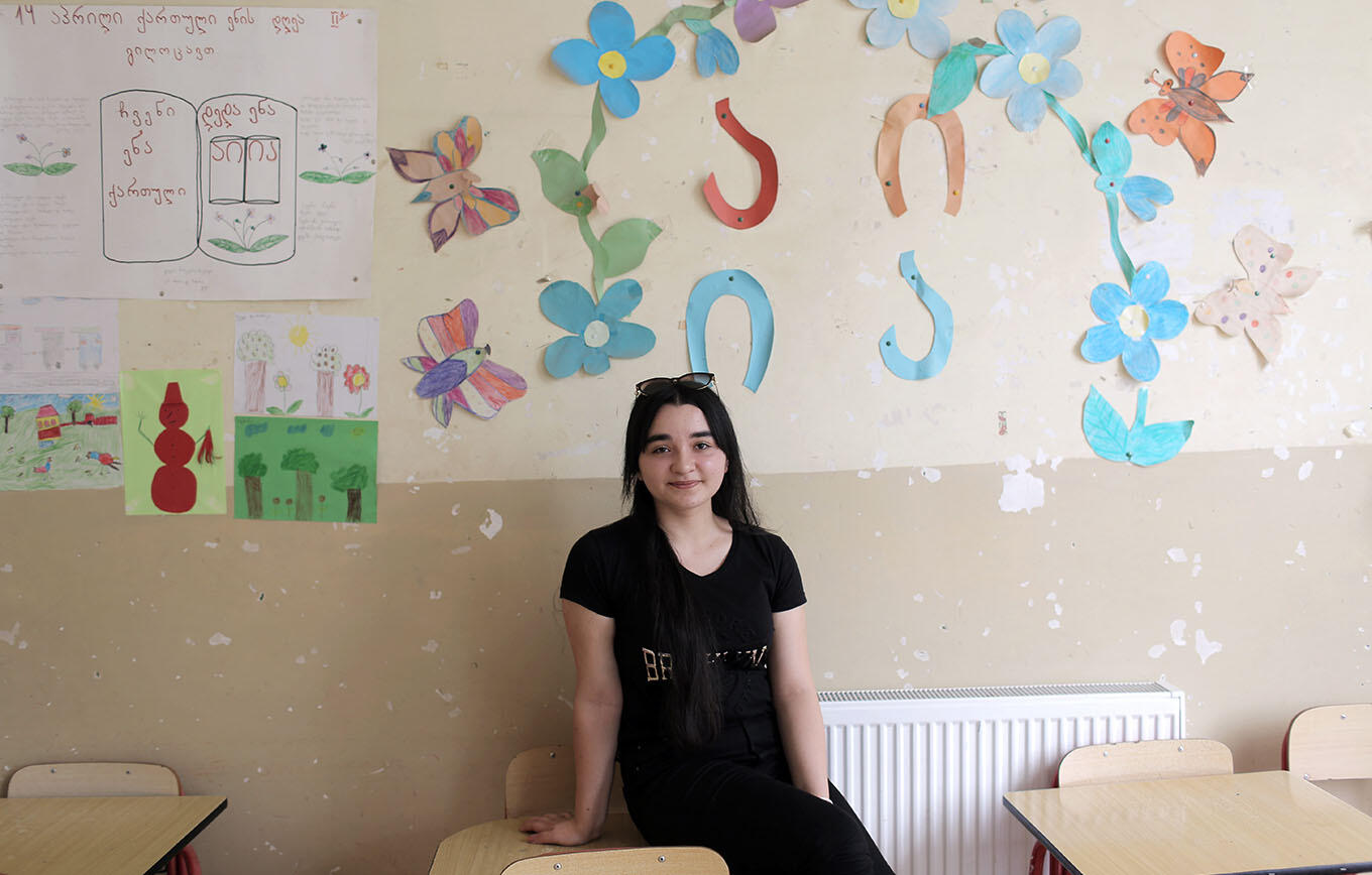 Student Alenda Bakhtiarova in a classroom at Karajala Public School