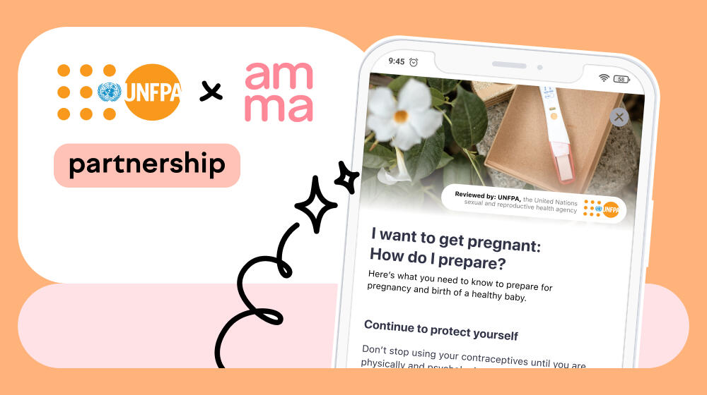 An orange card with UNFPA and AMMA logos and a cell phone with text on it