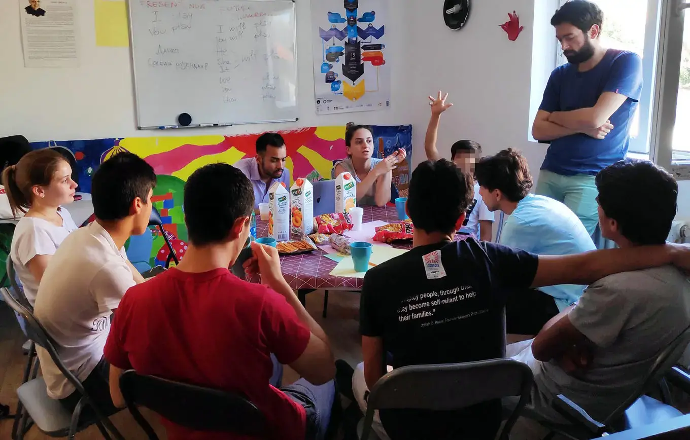 Young male migrants and refugees in Serbia learn critical life skills together