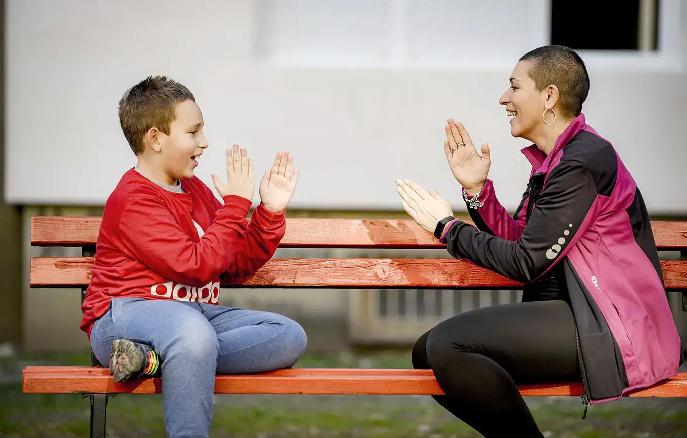 A mother plays with her child who has autism spectrum disorder